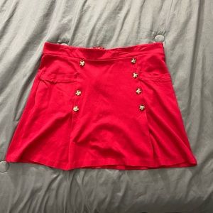 XL red Jessy B short skirt sold by Modcloth. It has pockets!